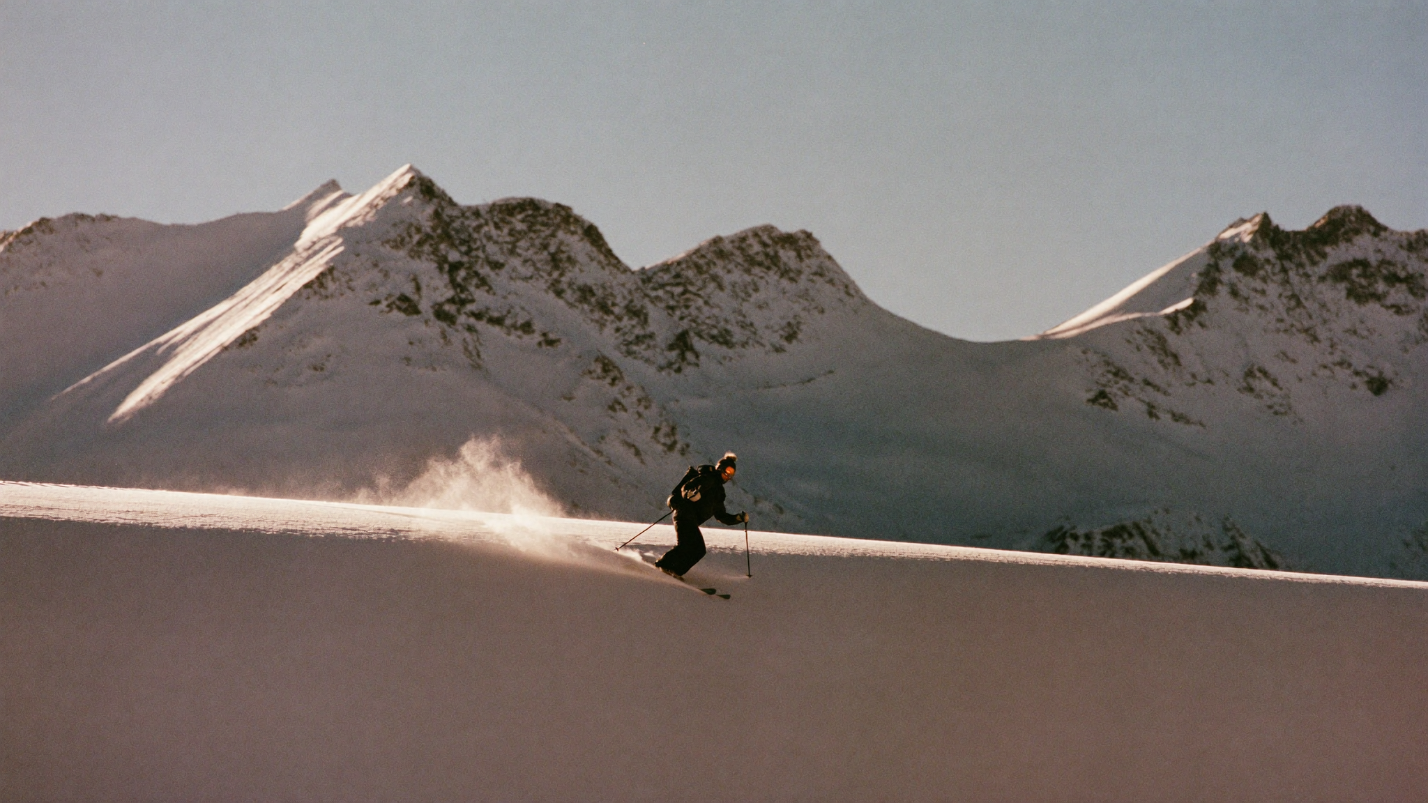 Skier on a groomed piste in the Pyrenees
