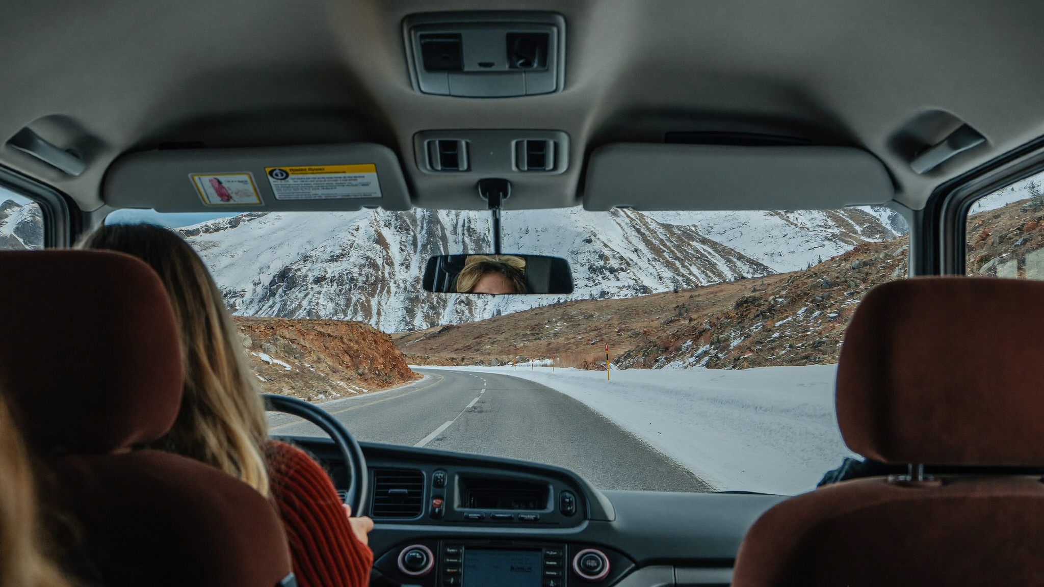 Private transfer on a winter mountain road toward Andorra